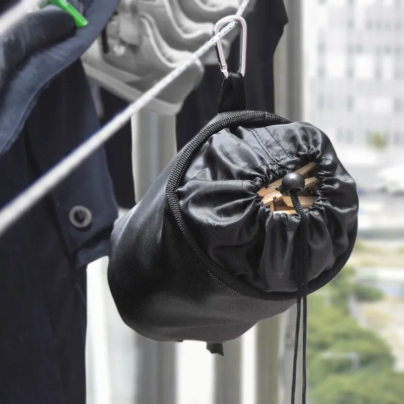 Bolsa para prendedores de roupa de poliéster...